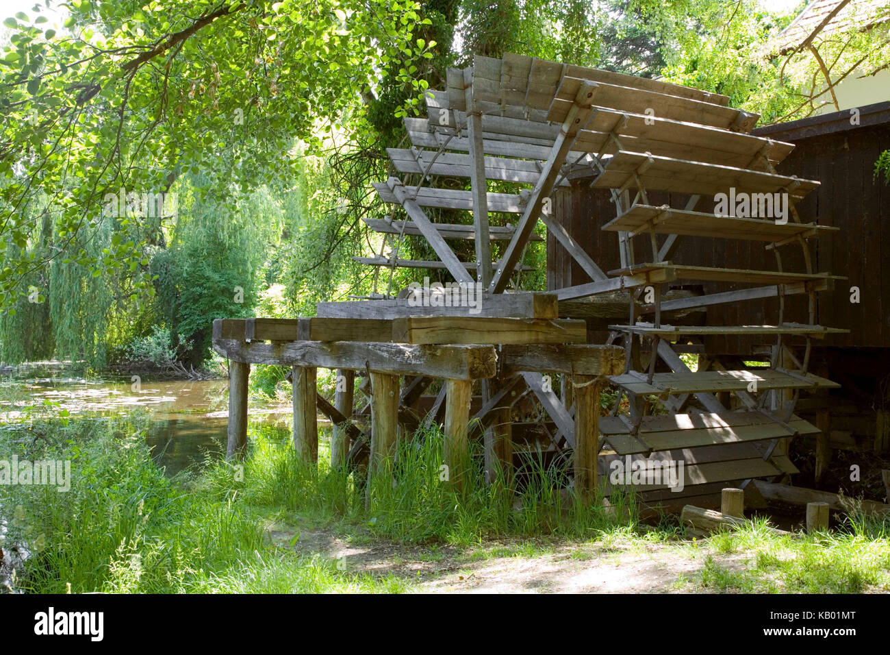 Old wooden house, mill on the shore of the river Maly Dunaj in Slovakia, Stock Photo