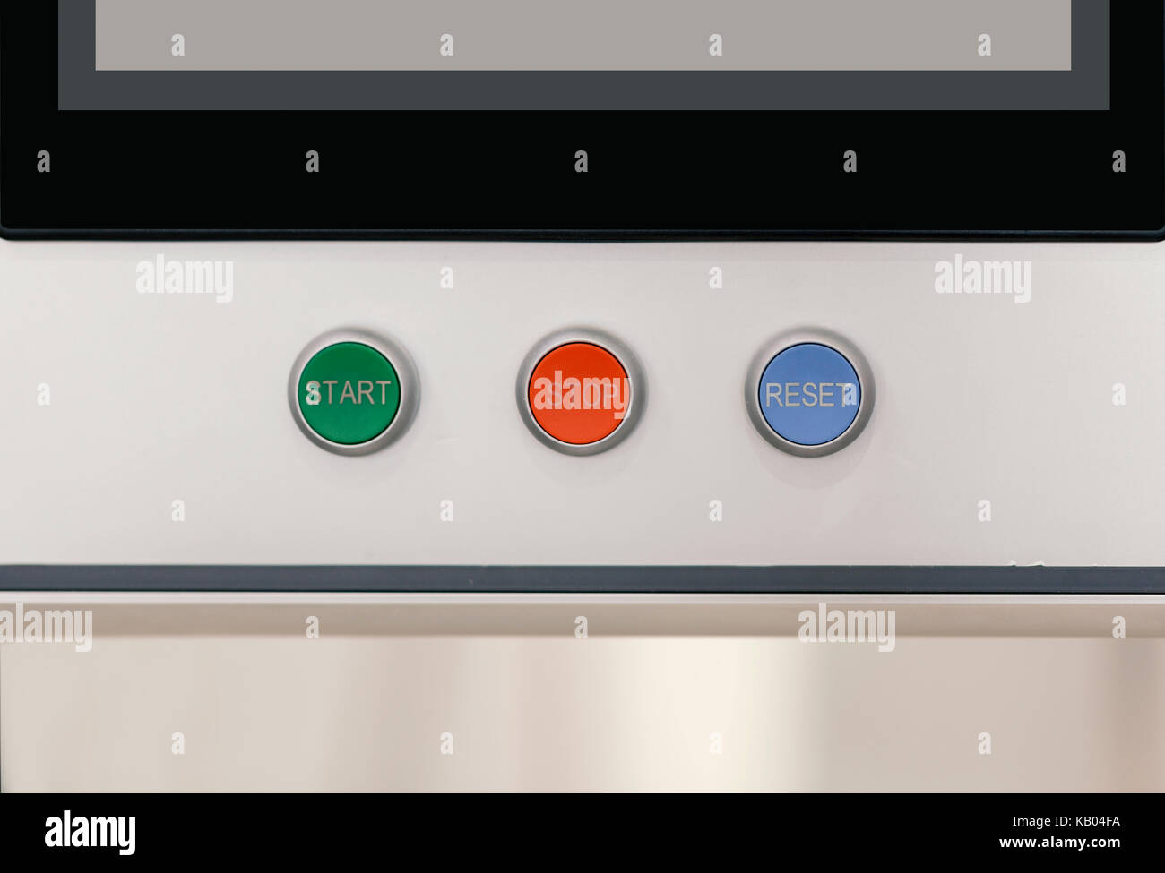 emergency stop red button with key on machine Stock Photo - Alamy