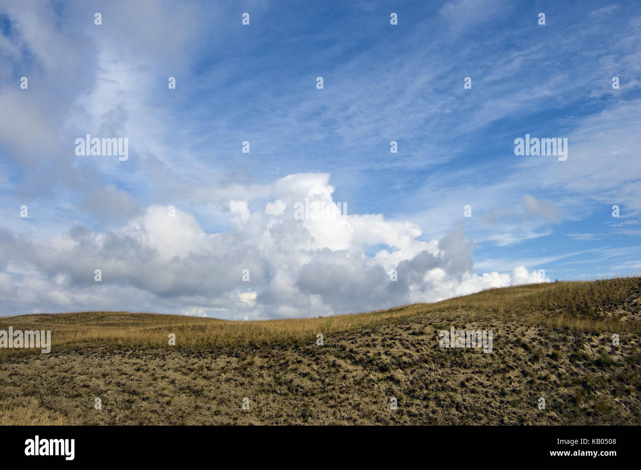 Lithuania, Nida, Smiltyne, Sand dune with grass, sky, clouds, Stock Photo