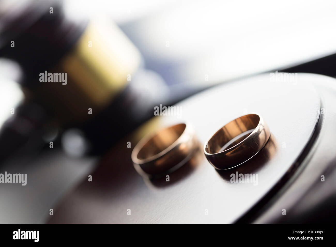 Divorce law concept. Wedding ring and gavel Stock Photo Alamy