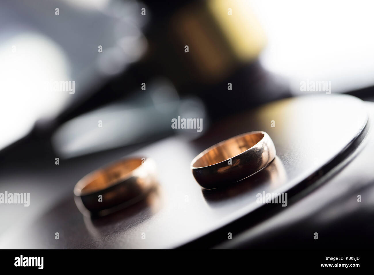 Divorce law concept. Wedding ring and gavel Stock Photo Alamy