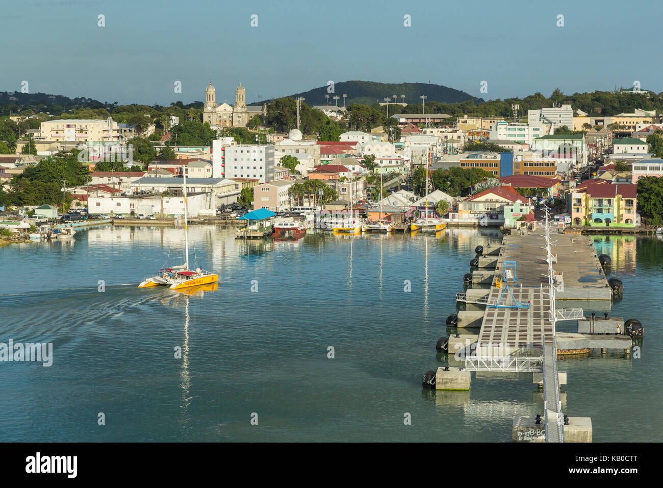 St. Johns, Antigua.  Harbor in Late Afternoon.  St. John's Cathedral on left in distance. Stock Photo