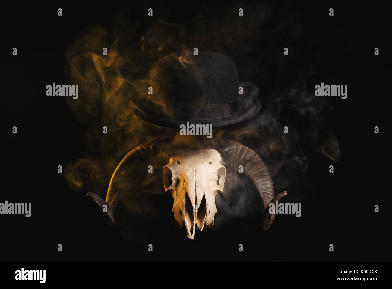 Ram skull with horns in a bowler hat, Halloween theme Stock Photo