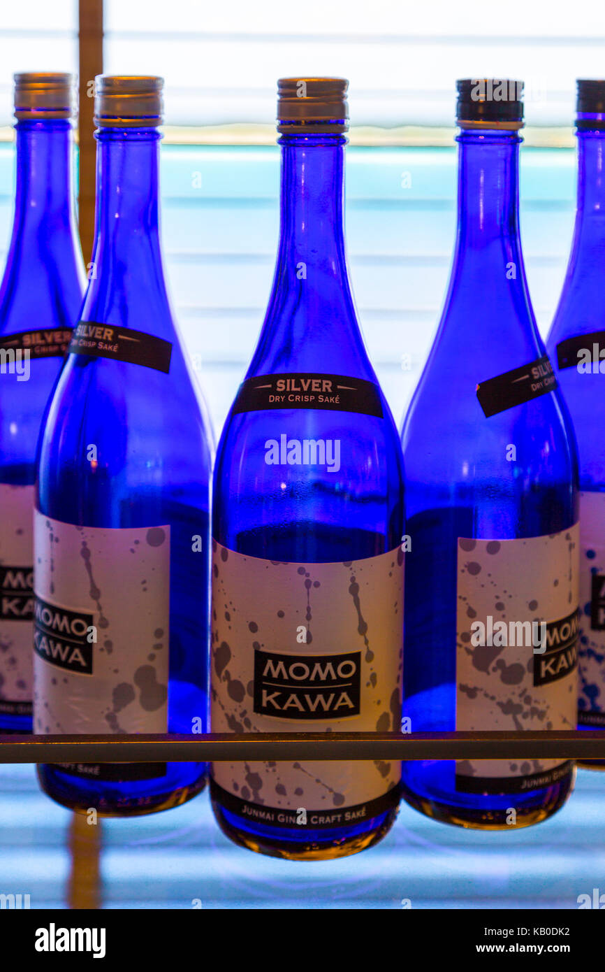 Bottles of Sake on Display in an Onboard Cruise Liner's Bar.  FOR EDITORIAL USE ONLY. Stock Photo