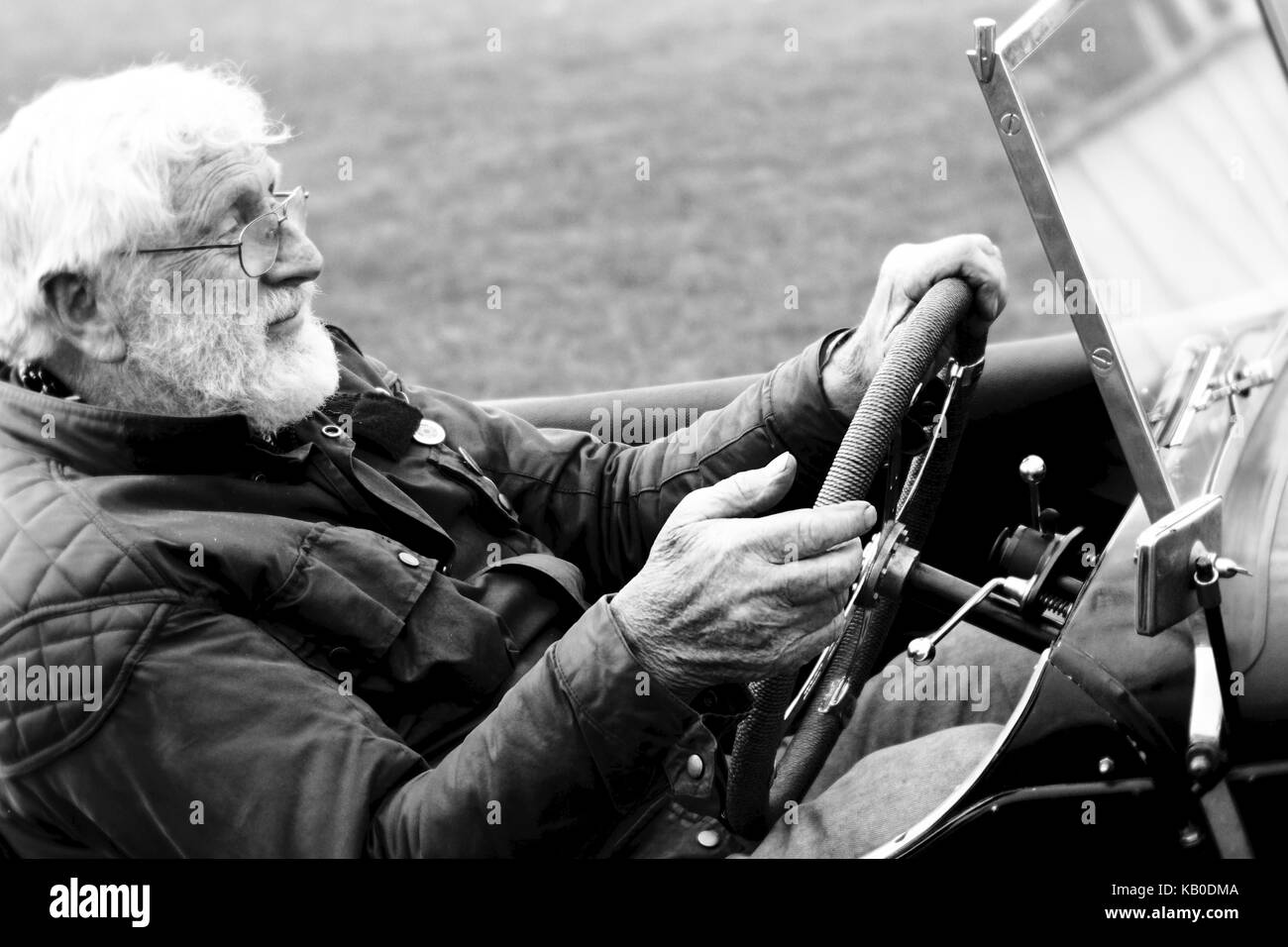 Old man and grandson in classic car at Kop Hill Climb Stock Photo