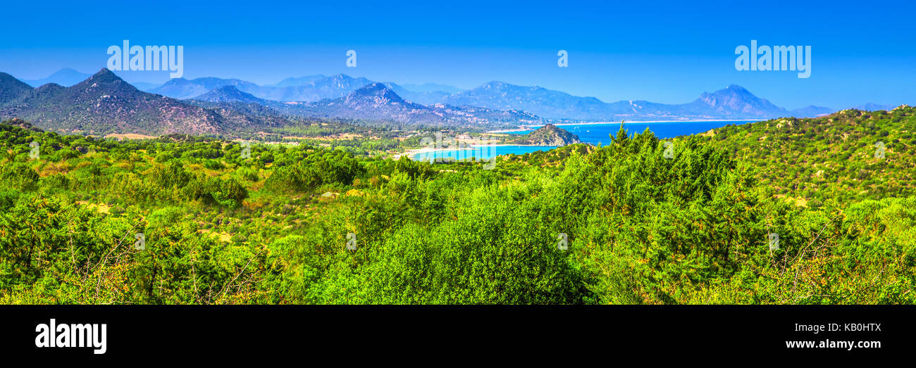 Spaggia di Santa Giusta beach with famous Peppino rock with azure clear water, Costa Rei, Sardinia, Italy. Stock Photo