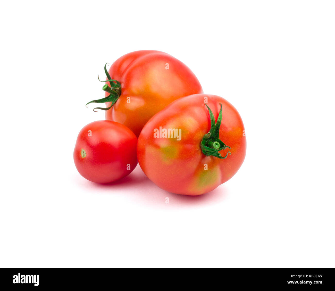 Tomatoe(s) isolated on white background. Clipping path included in jpeg. Stock Photo