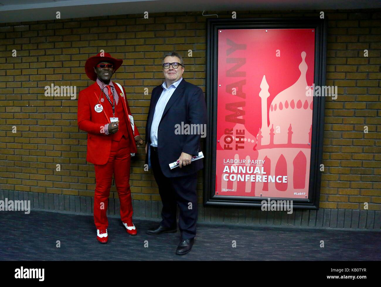 Deputy Labour Party leader Tom Watson with a labour delegate in a smart red suit. Stock Photo