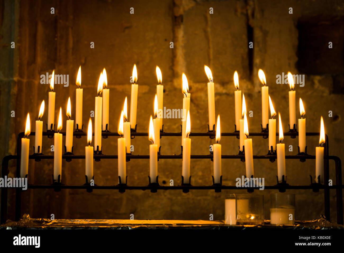 Prayer candles at Tewkesbury Abbey. Stock Photo