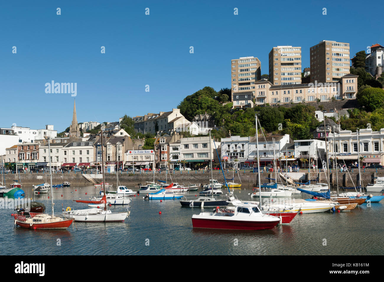 The Inner harbour in Torquay, Devon, UK on a sunny summer's day with clear blue skies. Seafood Coast, English Riviera. South West Coast Path Stock Photo