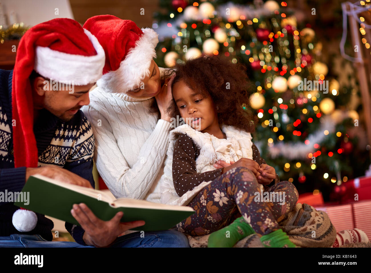 Afro American young family spending time together for Christmas Stock Photo