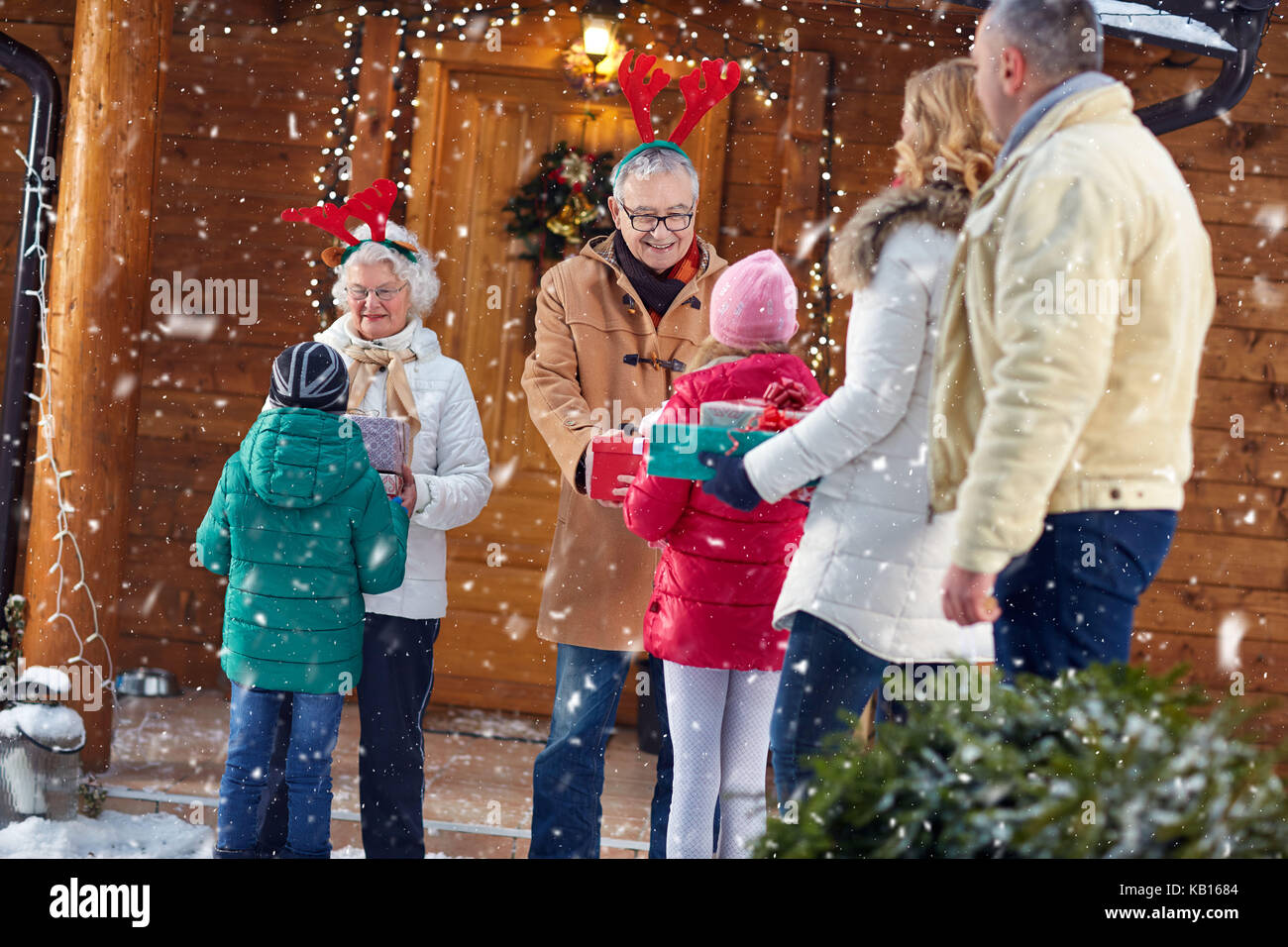 Happy grandparents at Christmas eve gathering family Stock Photo Alamy