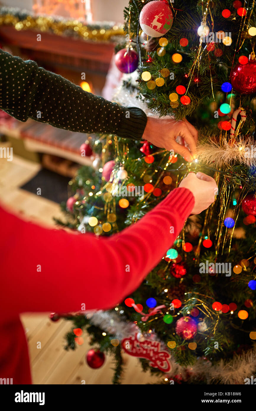 Decorating Christmas tree, concept Stock Photo Alamy