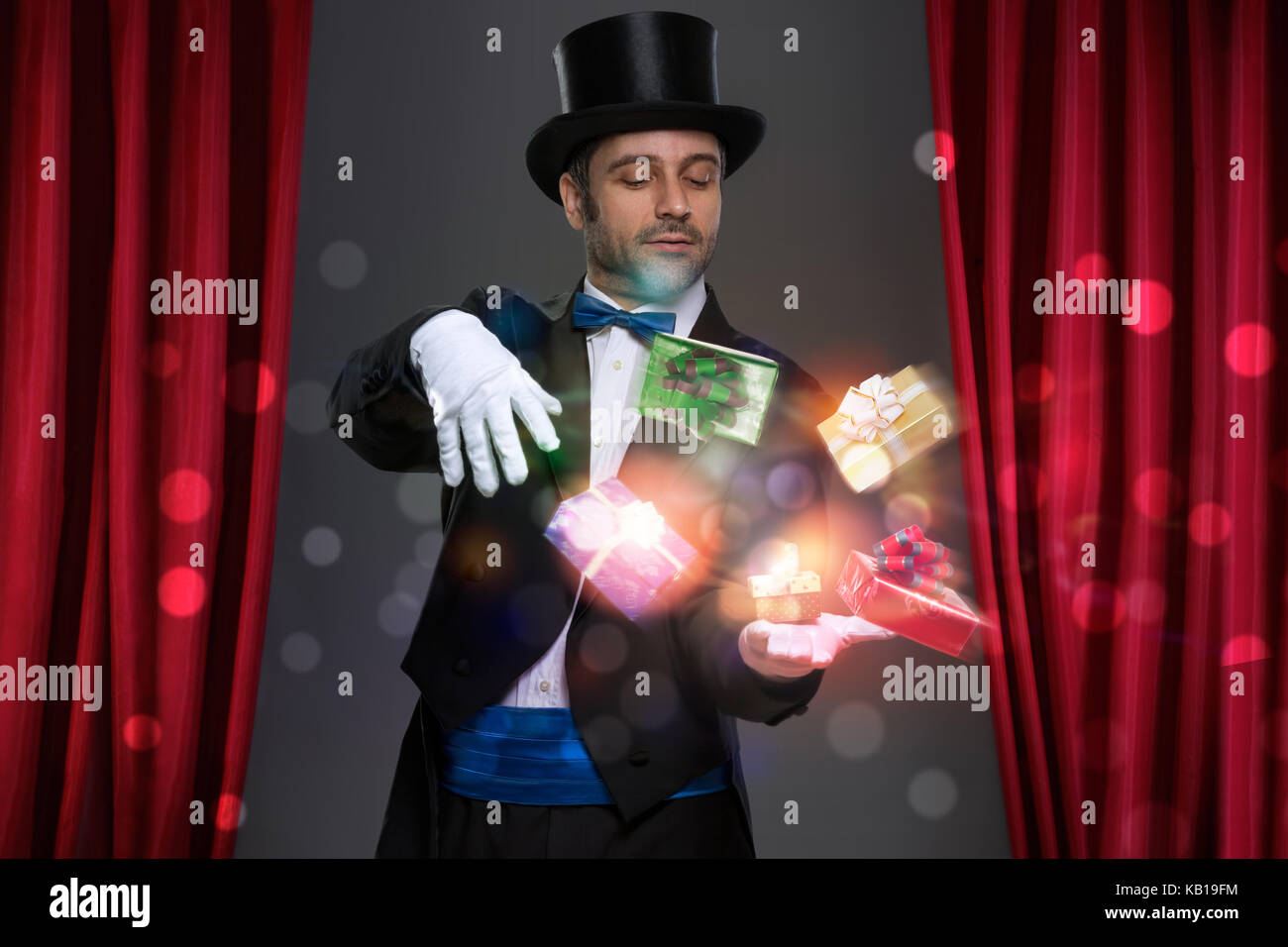 Magician have magic in his hands and making illusion with magic gift Stock Photo