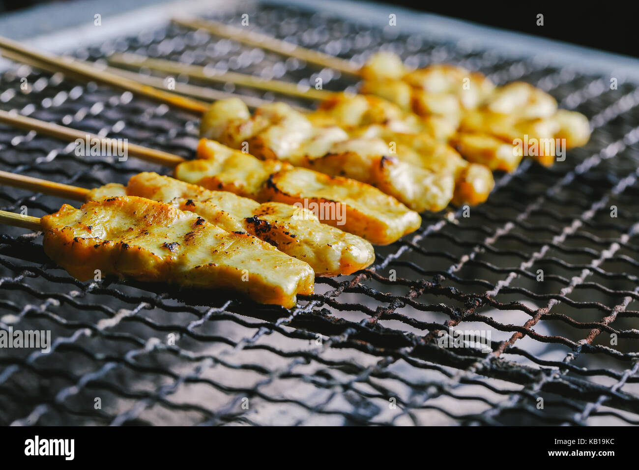 Pork satay skewer grill on charcoal stove Stock Photo Alamy