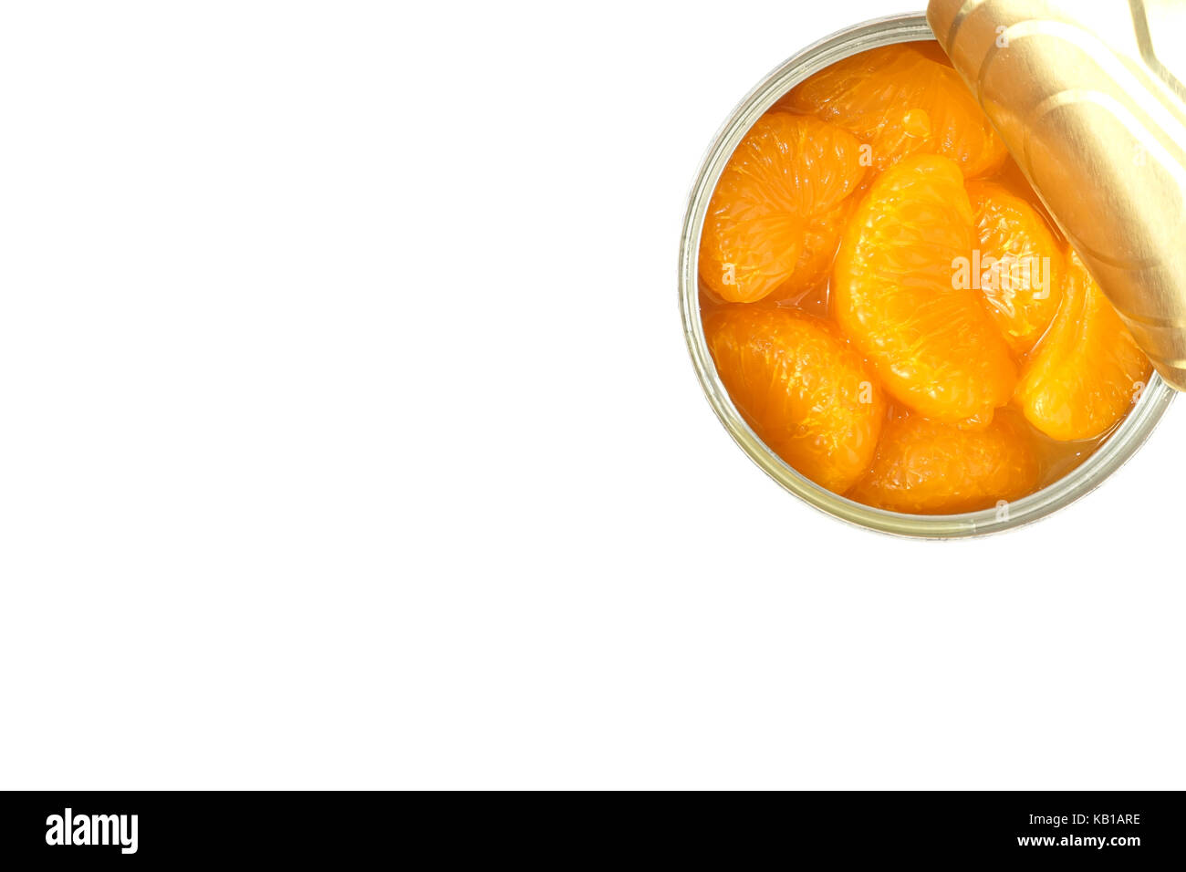 Closeup of an opened can of mandarin oranges on white background with copy space. Stock Photo