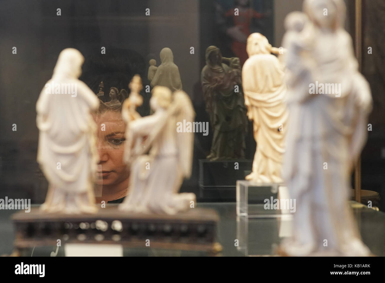 A view of small ivory statues in a museum in Florence in Italy. From a