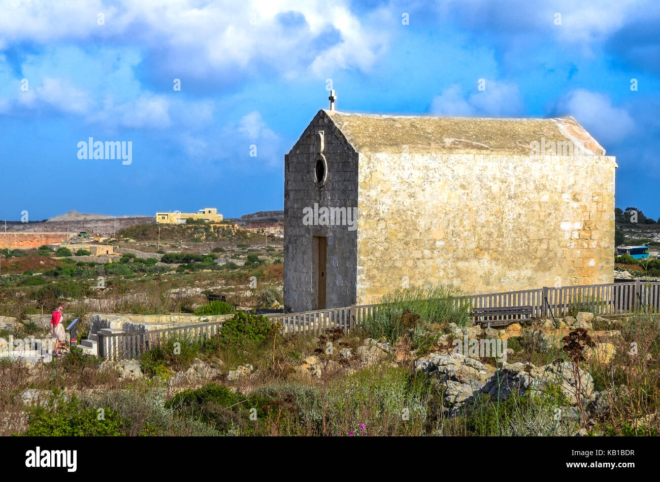 A woman at the chapel of St Mary Magdalene, built in the 17th century, in Dingli, Malta Stock Photo