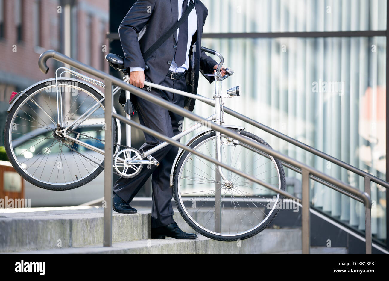 business man and his bicycle, concept bike go to work Stock Photo