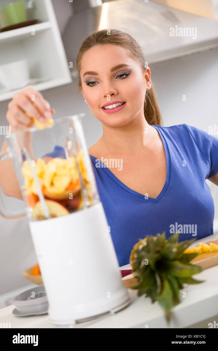 happy woman making fruit juice, Healthy eating Stock Photo Alamy