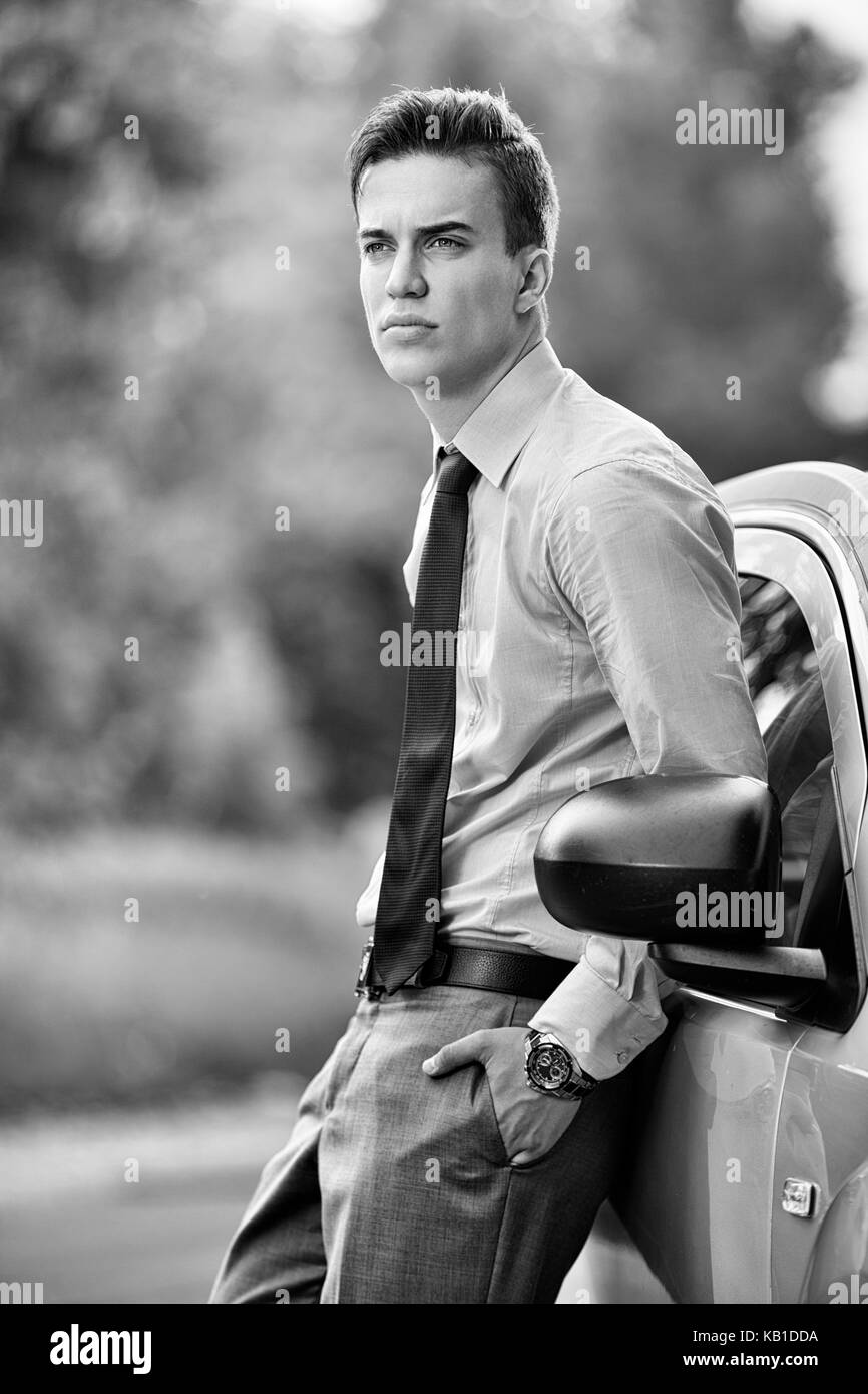 Handsome man next to the car Stock Photo