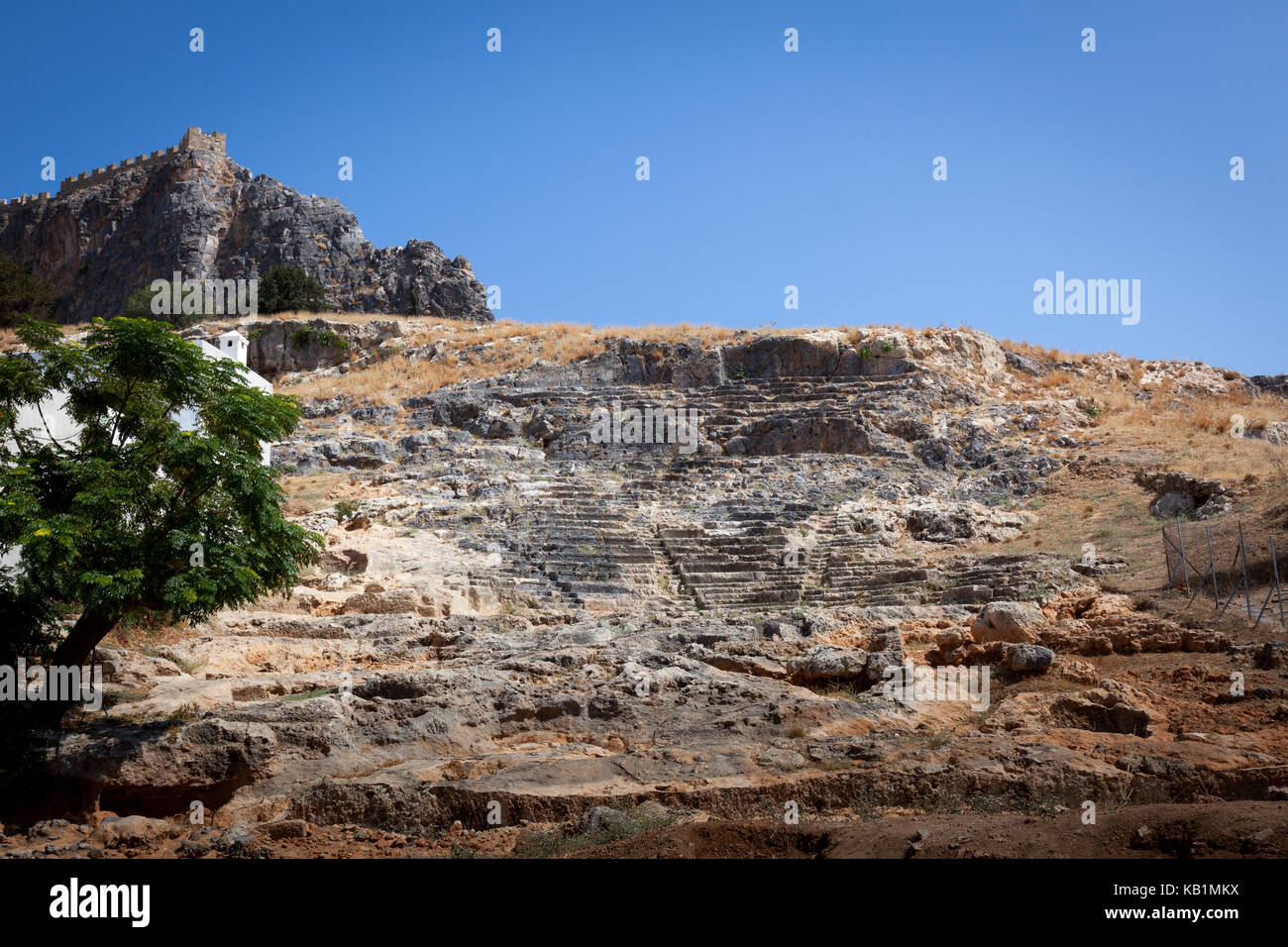 The remains of the amphitheatre in Lindos on the Greek island of Rhodes ...