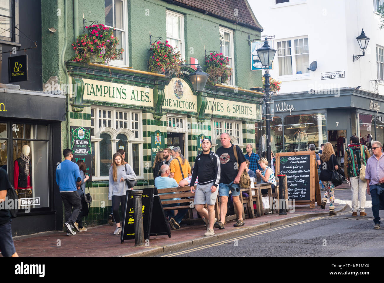 The Victory pub with a tiled facade and outdoor tables, Brighton, England, UK Stock Photo