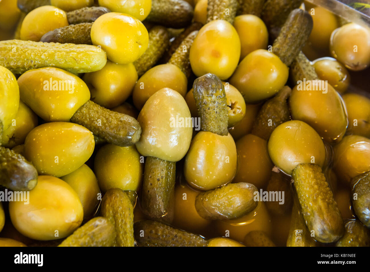 Close up green olives stuffed with gherkins Stock Photo Alamy