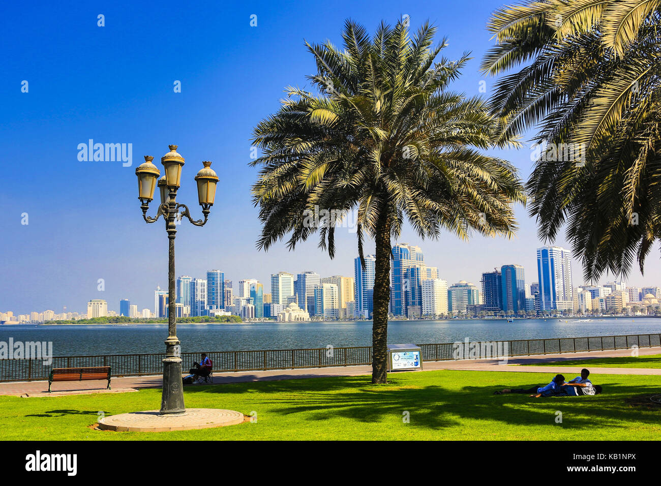 Tourists in a park, Khaued Lagoon, Sharjah, Stock Photo
