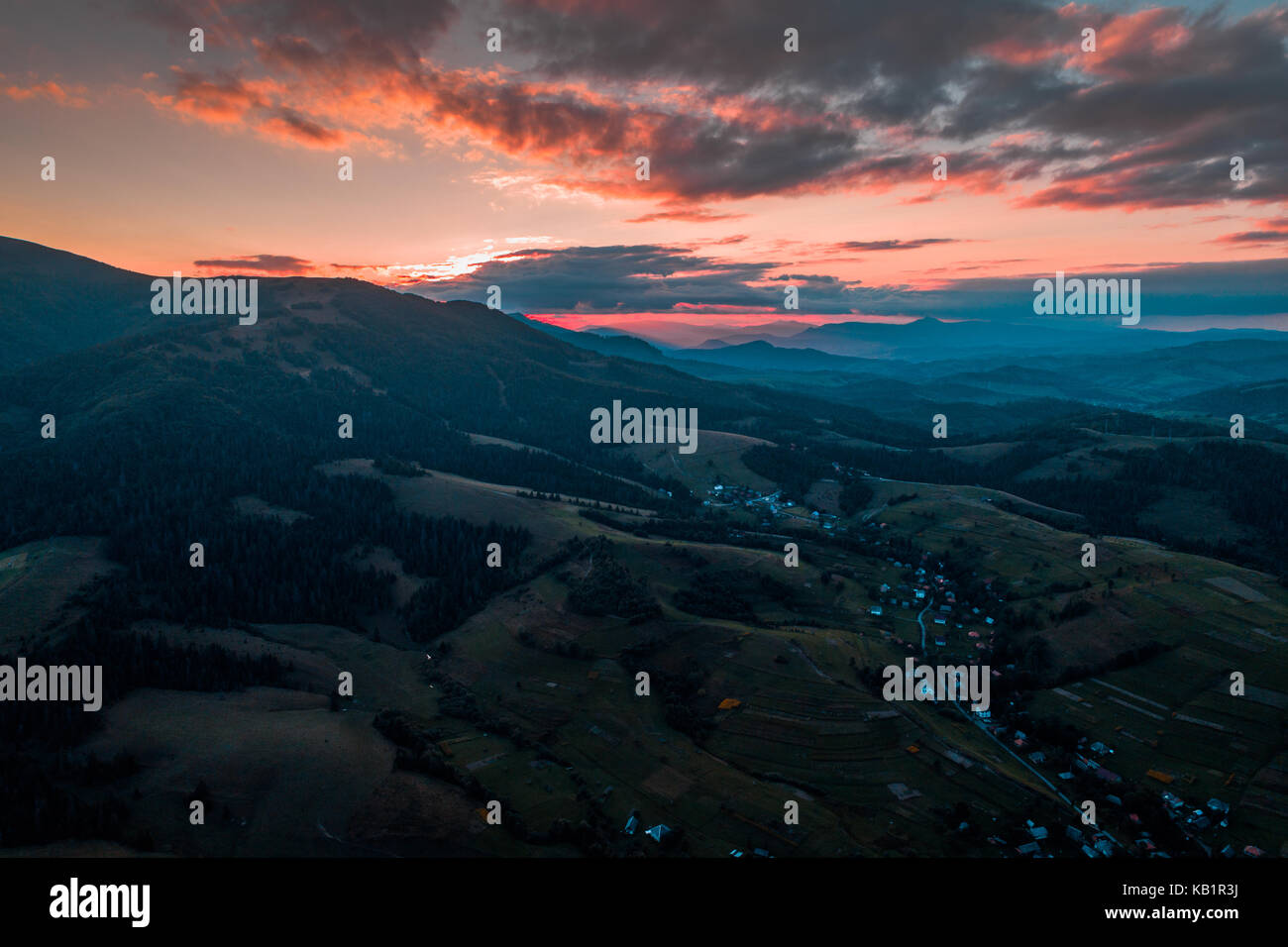 Aerial view of the village in the Carpathian mountains on the Sunset ...