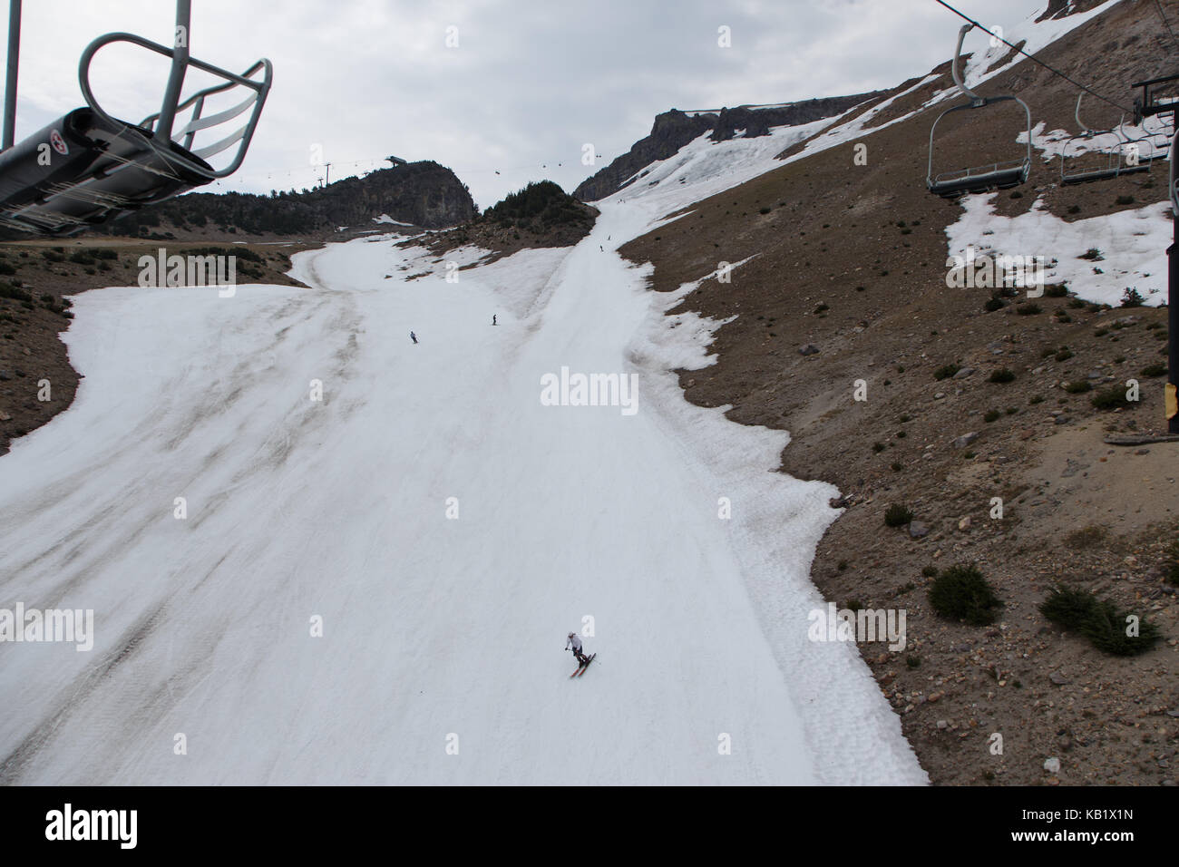 Skiers at Mammoth Mountain, August 4, 2017. Due to heavy winter precipitation, Mammoth Mountain remained open for skiing until August 6, 2017. Stock Photo