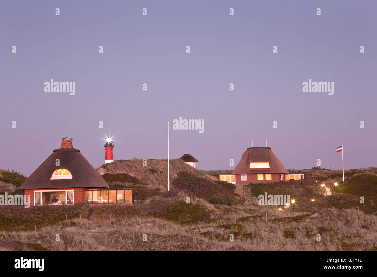 Lighthouse and thatched-roof houses in Hörnum, island Sylt, Schleswig - Holstein, Germany, Stock Photo