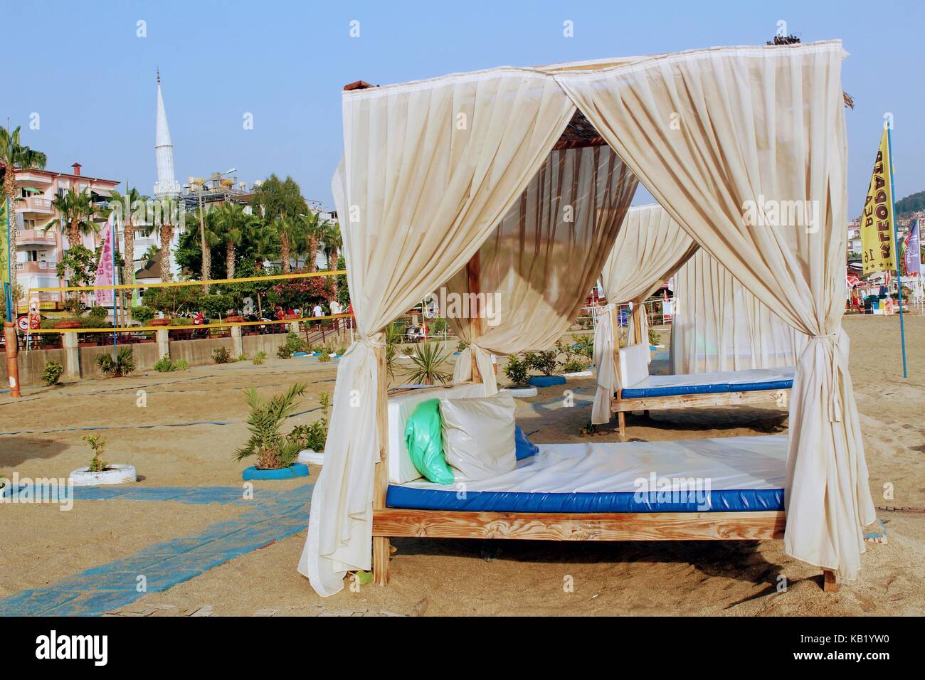 July, 2017 - Bed with canopy on the beach in Alanya, Turkey. Stock Photo