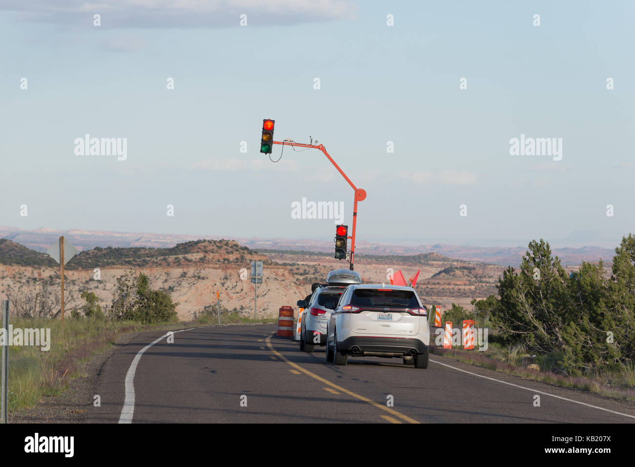 Cars waiting at an automated stop light at road construction site on Highway 12 in Southern Utah. Stock Photo