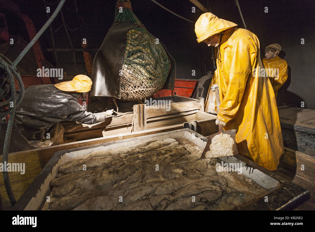 England, Lincolnshire, Grimbsy, national Fishing Heritage Centre museum, exhibit, sailors with catch, Stock Photo