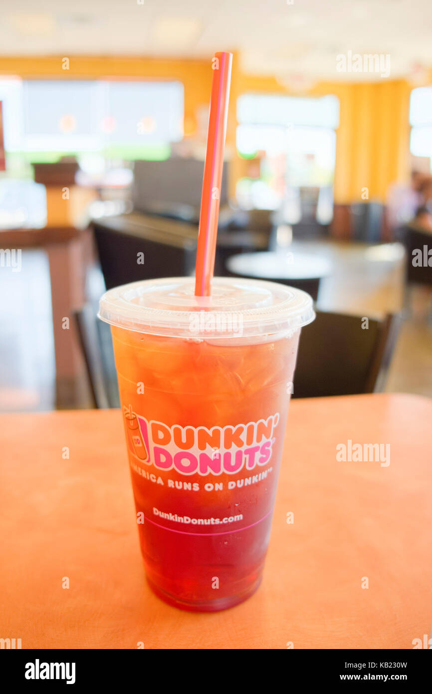 Plastic cup of sweat tea at a Dunkin Donuts fast food restaurant in