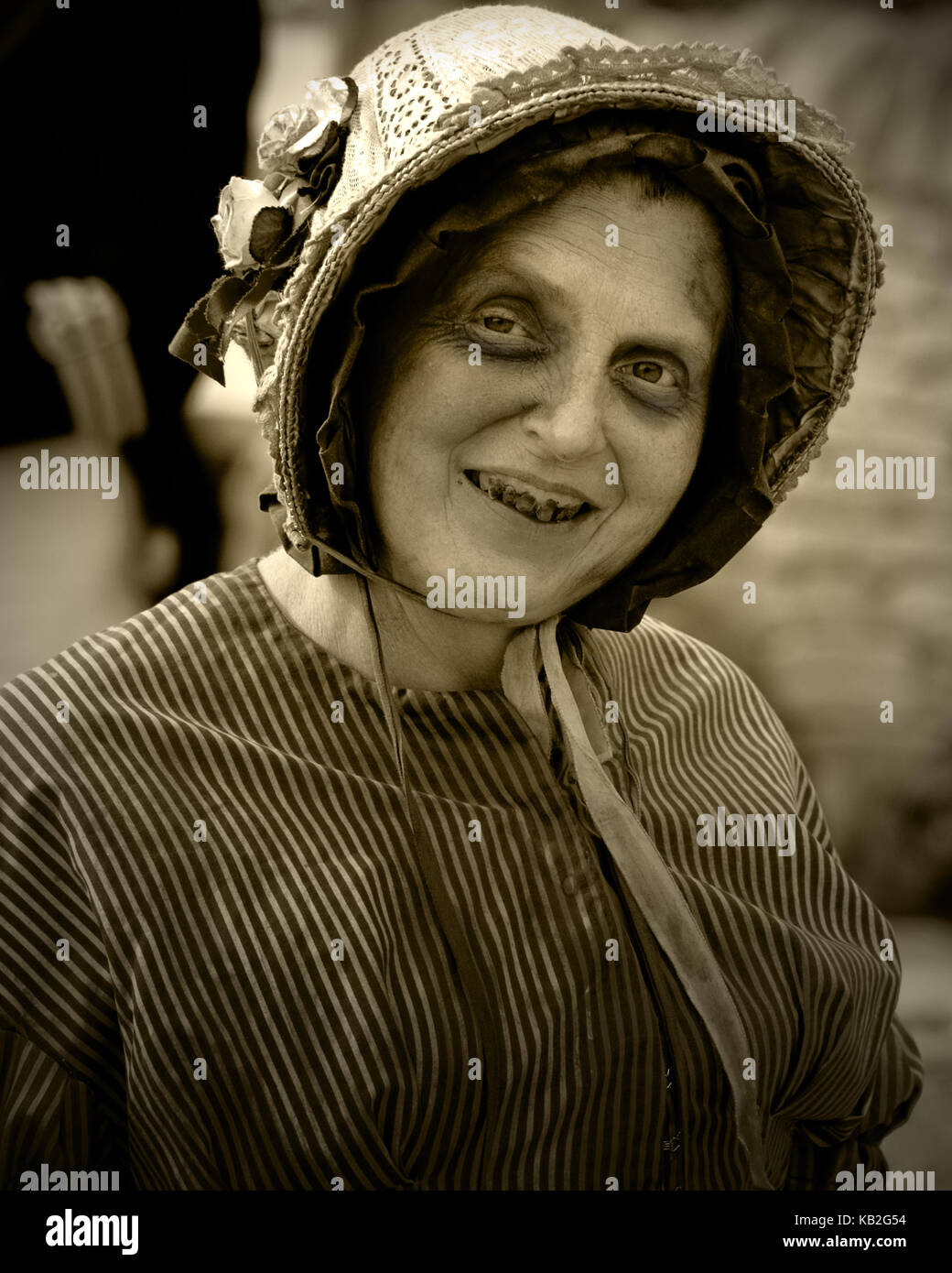 Ill looking Victorian lady at historical event Stock Photo