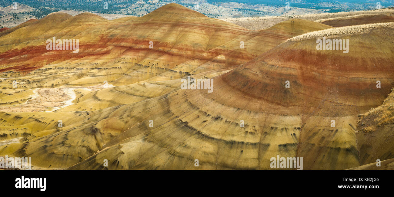 Panoramic image of Painted Hills National Monument's colourful sediments of mudstone, siltstone, and shale, Oregon, USA. Stock Photo
