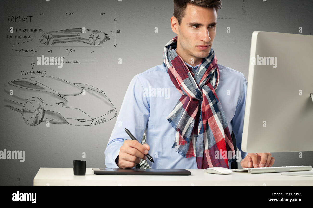 Car Designer Pc designer sitting front of computer and draws a model car Stock Photo ...