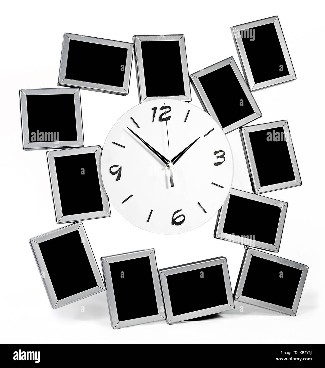 Black and white wall clock with twelve photo frames set Stock Photo Alamy