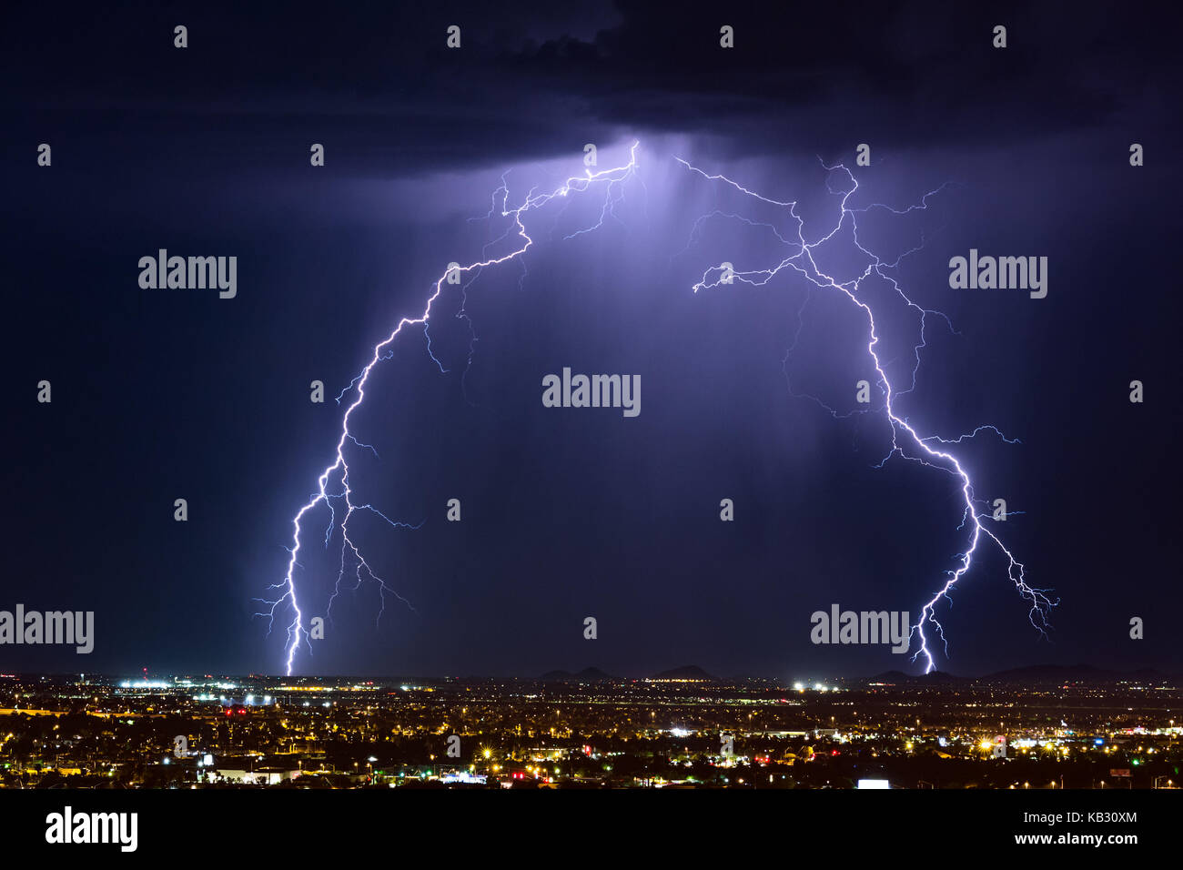 Intense thunderstorm lightning strike over the city in Phoenix, Arizona