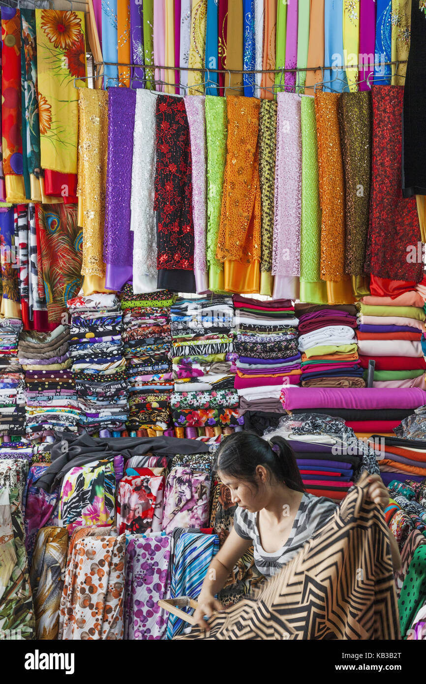 Vietnam, Nha Trang, central market Cho Dam, sales of coloured fabrics, Stock Photo