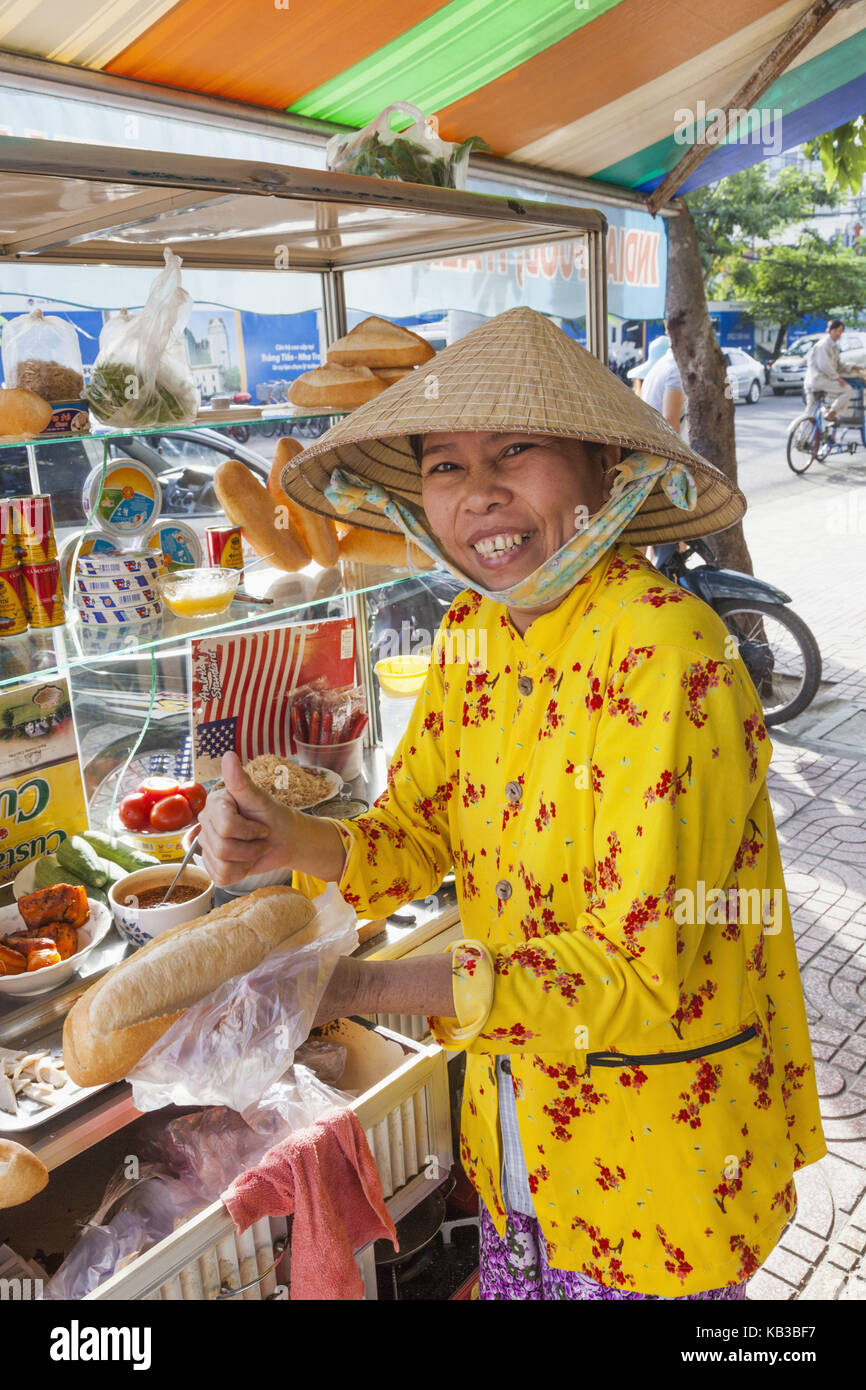 Vietnam, Nha Trang, snack stall, woman sold, sandwiches, smile, view camera, Stock Photo