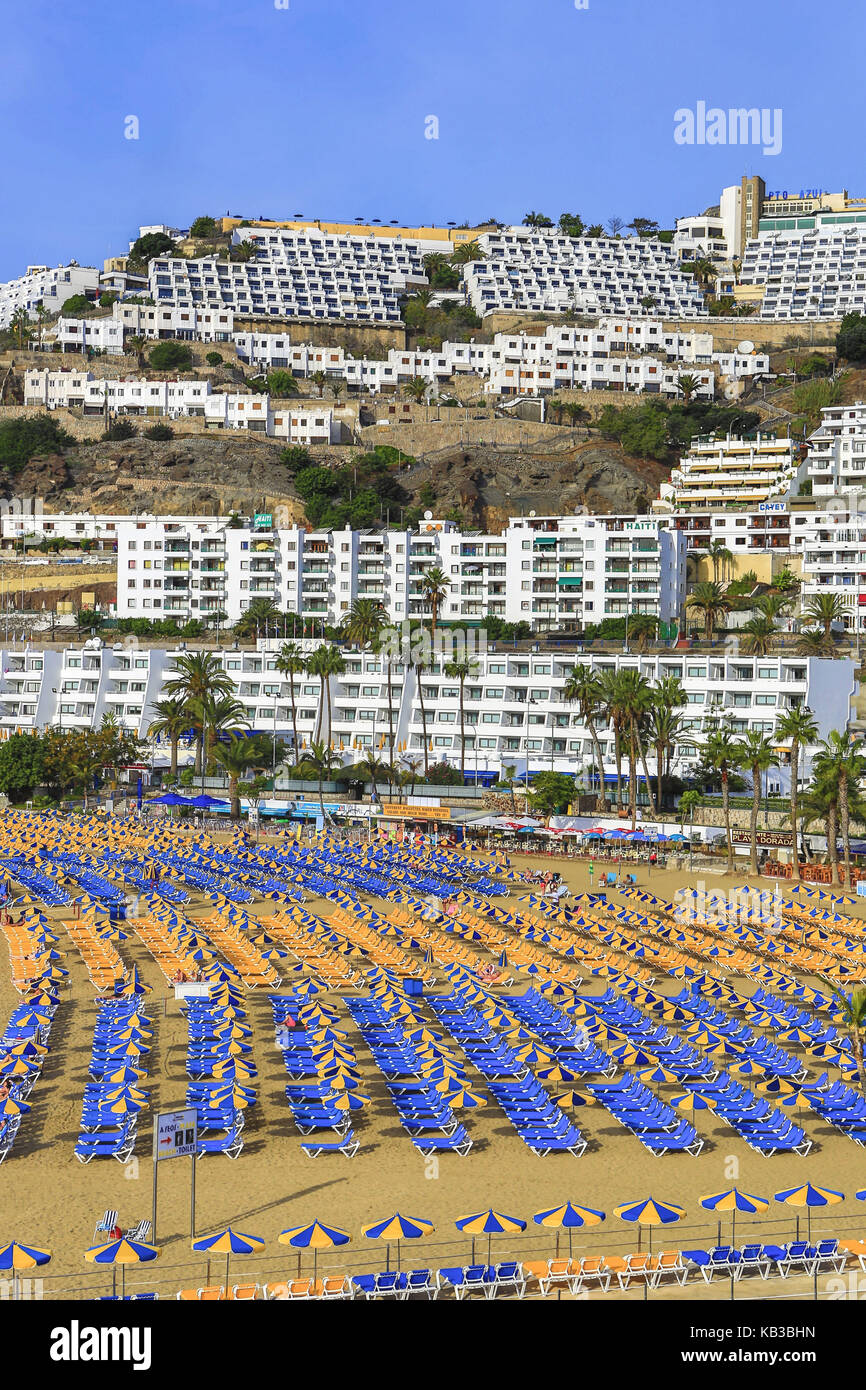 Spain, Canary islands, Gran Canaria, Puerto Rico, beach, deck chairs, mass tourism, Stock Photo