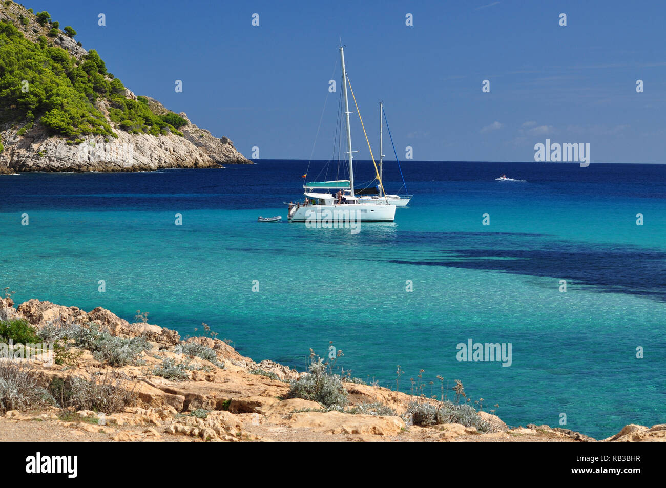 Cala Molto idyllic lagoon with yachts view in the balearic island Mallorca in Spain Stock Photo