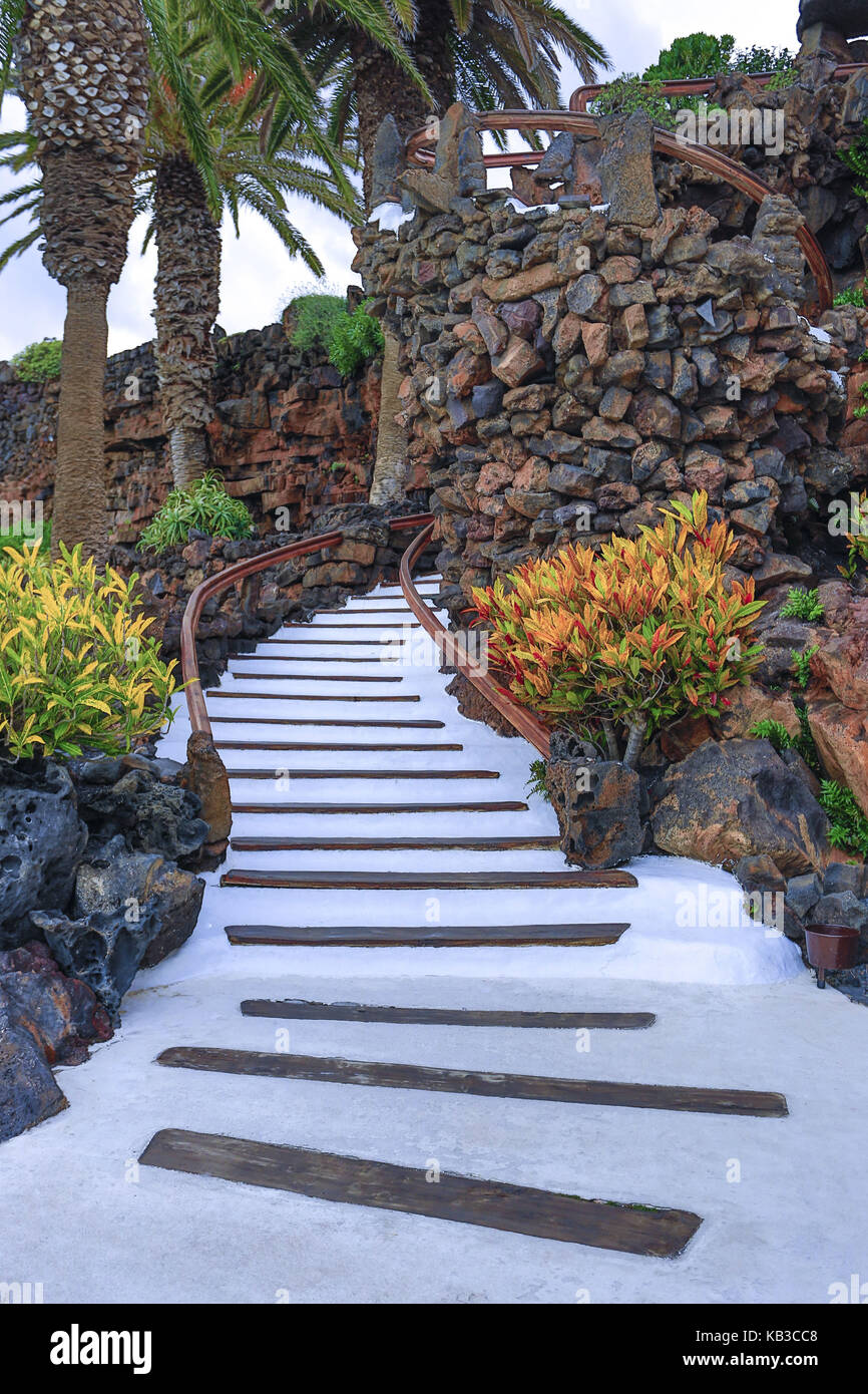Spain, Canary islands, Lanzarote, Jameos del Agua, stairs, palms, lava rocks, Stock Photo