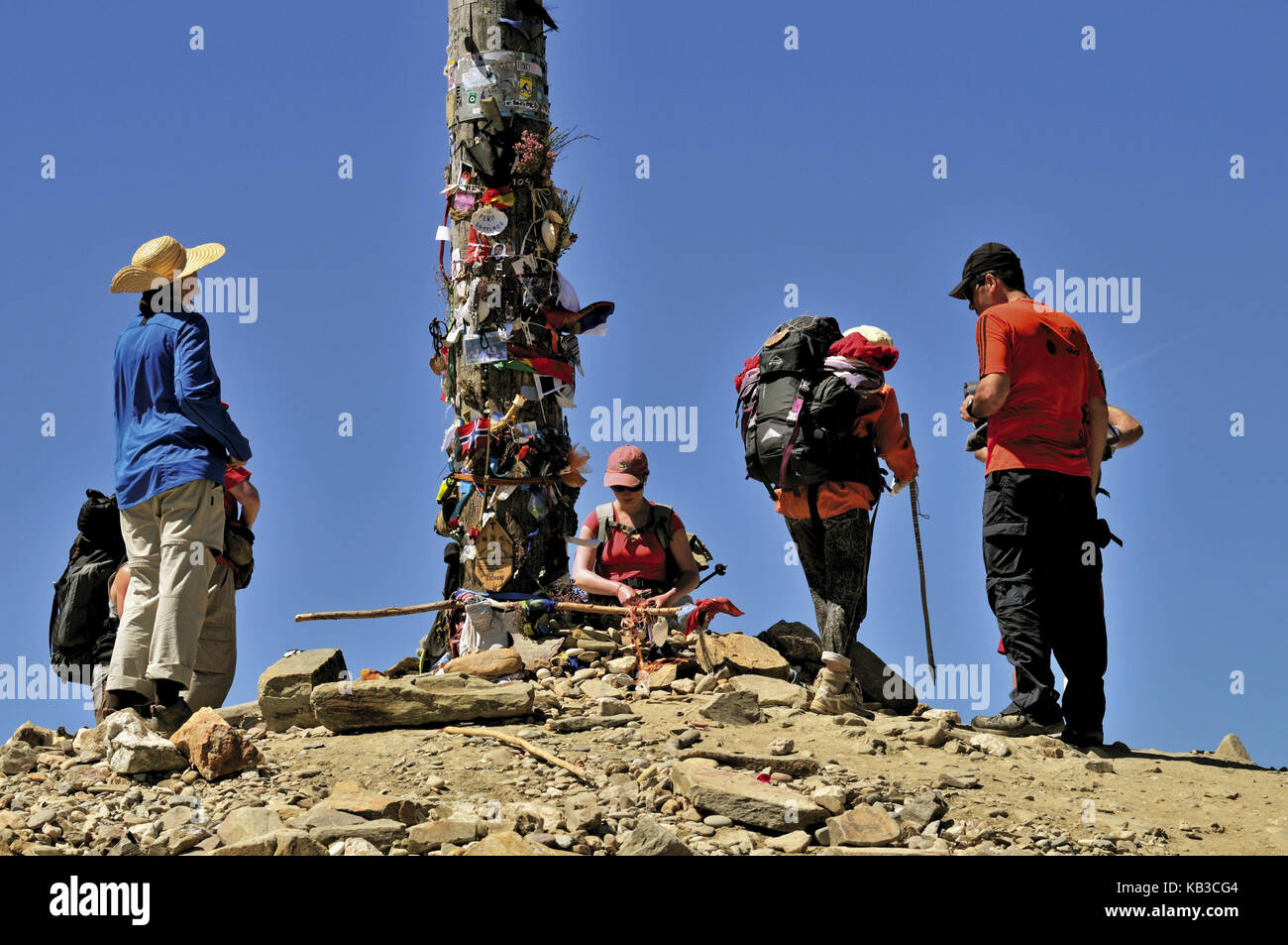 Spain, Way of St. James, jacobean pilgrim on the iron cross of Monte