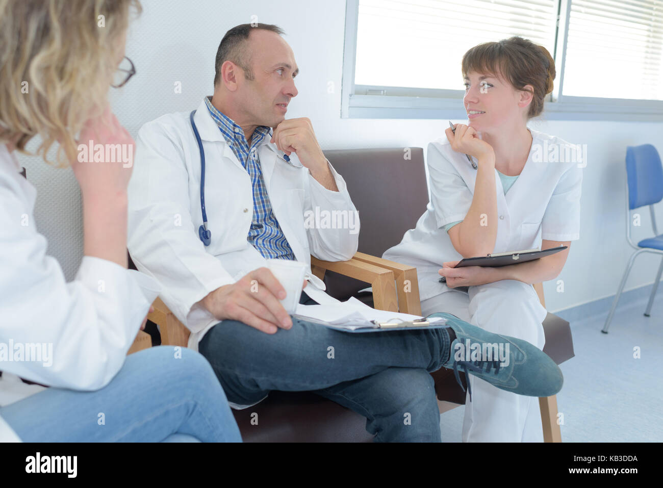 team of doctors having a meeting in the meeting room Stock Photo - Alamy