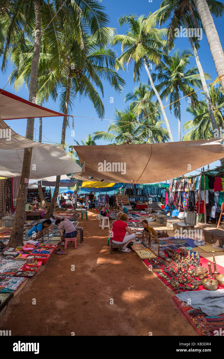 India, Goa, Anjuna, flea market, market stalls in the shade Stock Photo