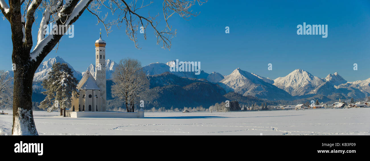 Panorama of the alps near Füssen in the Allgäu while pilgrimage church ...